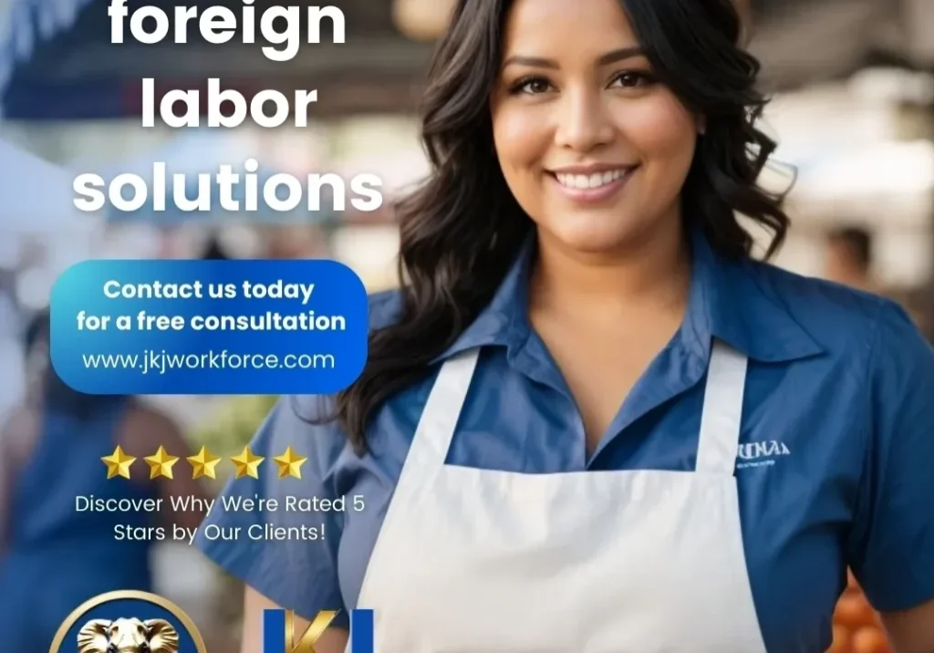 A woman in white shirt holding an apron.